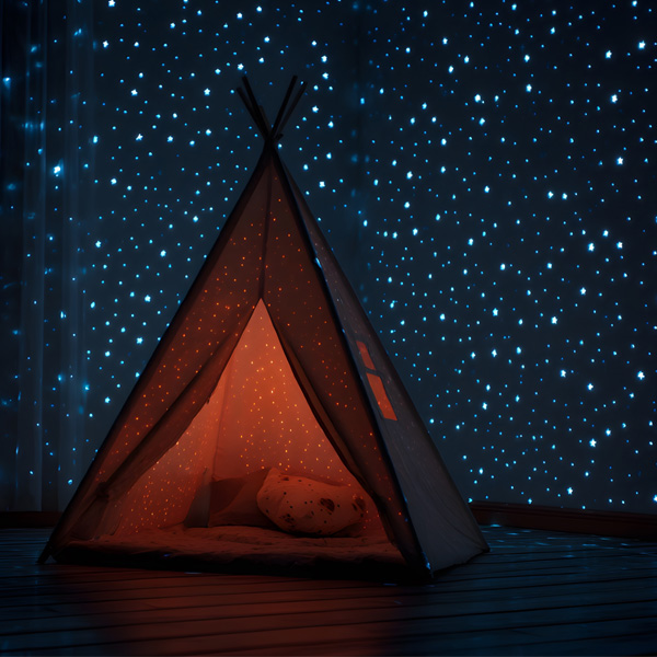 Image of tent in a room with a ceiling of starry skies
